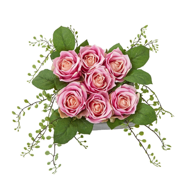 Arrangement artificiel de roses dans un vase carré en céramique