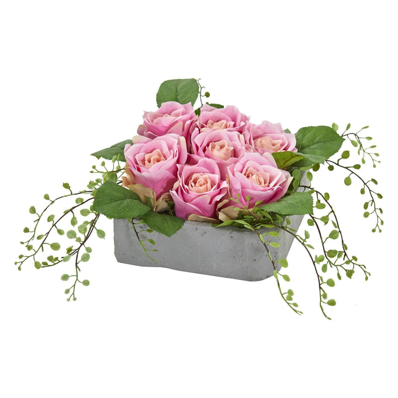 Arrangement artificiel de roses dans un vase carré en céramique